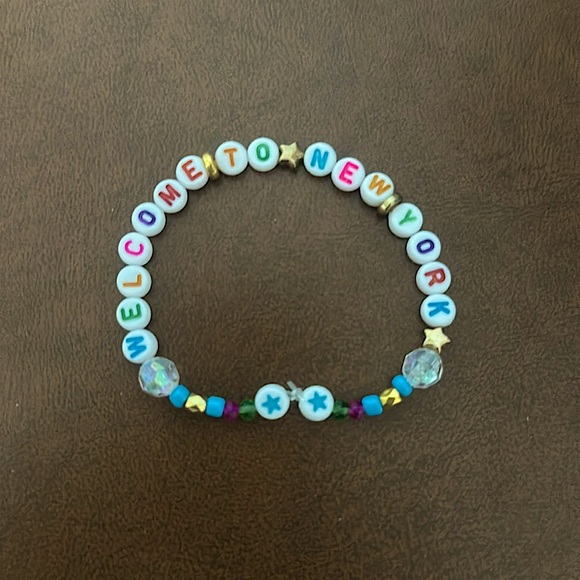 5 for $10 Taylor Swift Handmade Friendship Beaded Bracelet
“Welcome To New York” - Picture 1 of 1